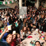 Voluntarios participando en el Festival del Mes de la Sopa Solidaria
